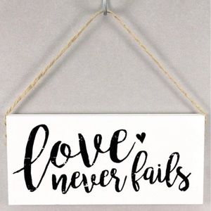 Love never fails sign